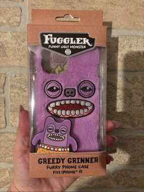 Fuggler Greedy Grinner Purple Furry Phone Case for iPhone 15